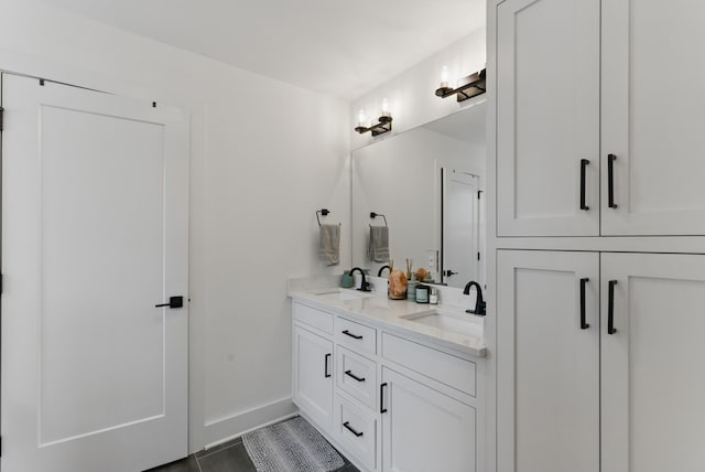2006 Manchester Ave, Nashville, TN 37218 - full bath with double vanity, baseboards, and a sink