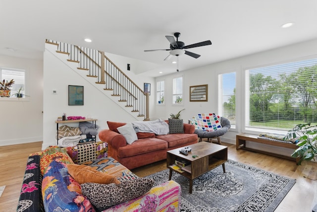 2006 Manchester Ave, Nashville, TN 37218 - living room featuring wood finished floors, a wealth of natural light, a ceiling fan, and stairs