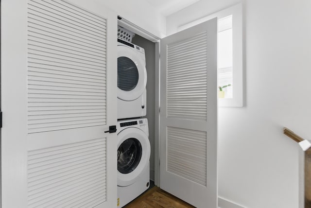 2006 Manchester Ave, Nashville, TN 37218 - washroom with dark wood-style floors, stacked washer / dryer, and laundry area