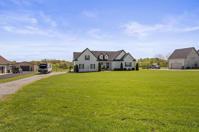 modern farmhouse style home with driveway and a front yard