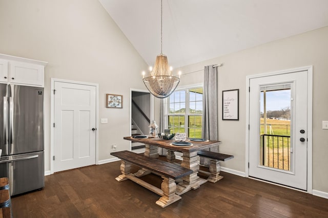dining area with stairway, high vaulted ceiling, a chandelier, baseboards, and dark wood-style floors