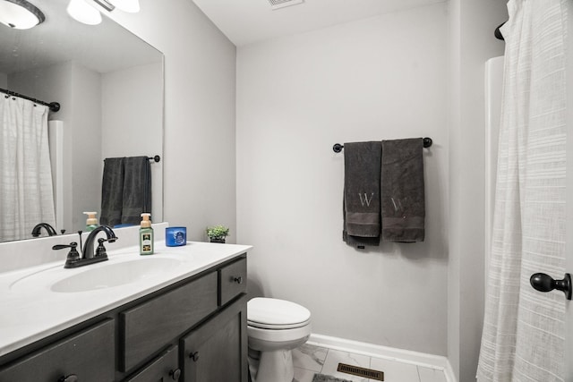 bathroom featuring marble finish floor, visible vents, toilet, vanity, and baseboards