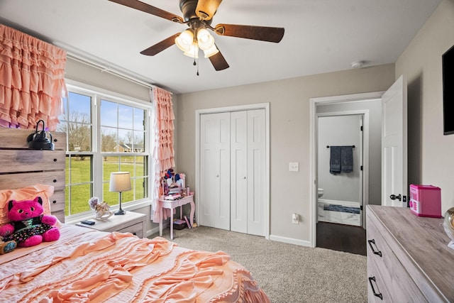 bedroom with ceiling fan, baseboards, a closet, and light colored carpet
