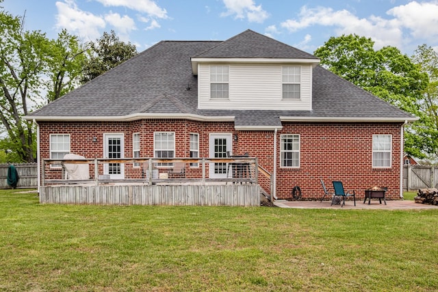 102 Munson Ct, Smyrna, TN 37167 - rear view of house with brick siding, a patio area, a wooden deck, and roof with shingles