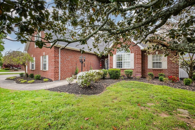 102 Munson Ct, Smyrna, TN 37167 - view of front of home featuring brick siding and a front yard