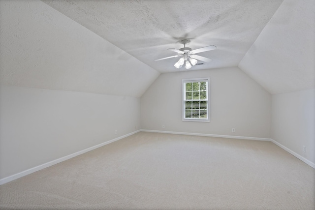 102 Munson Ct, Smyrna, TN 37167 - bonus room featuring ceiling fan, baseboards, lofted ceiling, a textured ceiling, and light colored carpet