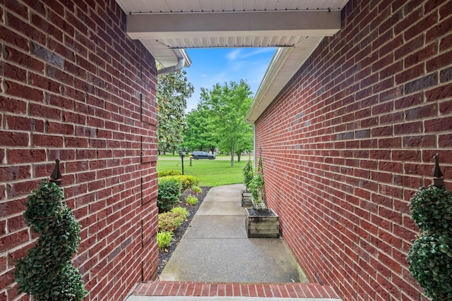 102 Munson Ct, Smyrna, TN 37167 - view of side of home featuring brick siding and a lawn