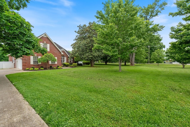 102 Munson Ct, Smyrna, TN 37167 - view of yard featuring driveway and a garage
