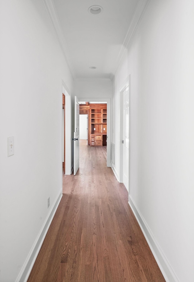 1008 Green Hill Cv, Brentwood, TN 37027 - corridor featuring wood finished floors, baseboards, and ornamental molding
