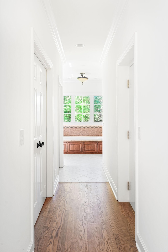 1008 Green Hill Cv, Brentwood, TN 37027 - hallway featuring ornamental molding and light wood-type flooring