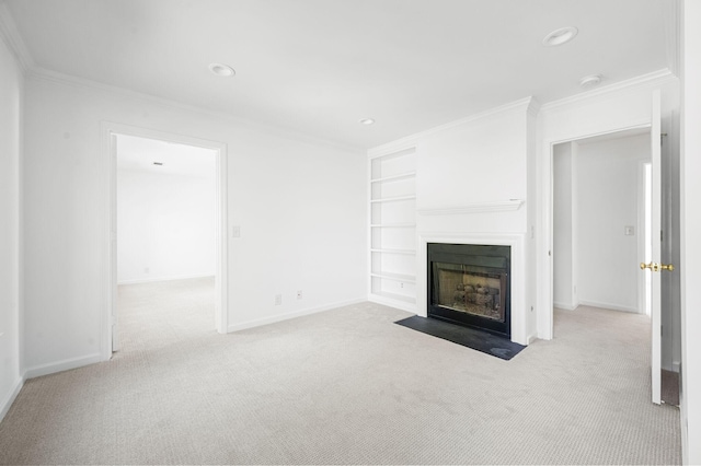 1008 Green Hill Cv, Brentwood, TN 37027 - unfurnished living room featuring built in shelves, baseboards, ornamental molding, and carpet flooring
