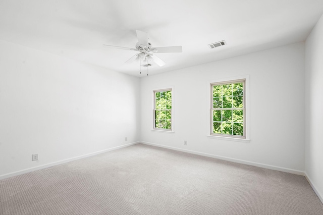1008 Green Hill Cv, Brentwood, TN 37027 - empty room with visible vents, a ceiling fan, baseboards, and light carpet