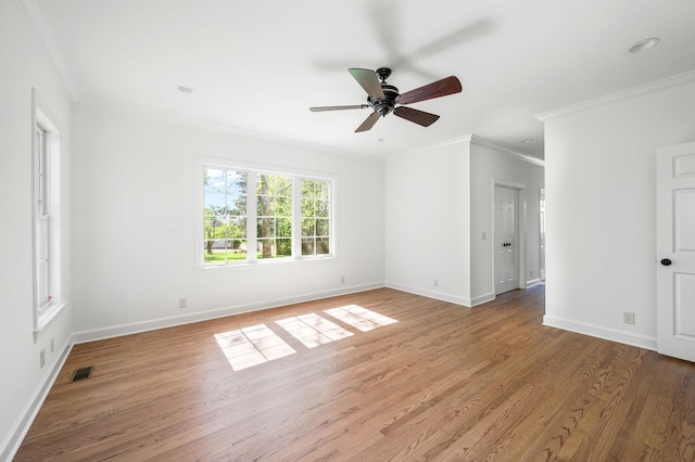 1008 Green Hill Cv, Brentwood, TN 37027 - unfurnished room with light wood finished floors, baseboards, visible vents, a ceiling fan, and ornamental molding