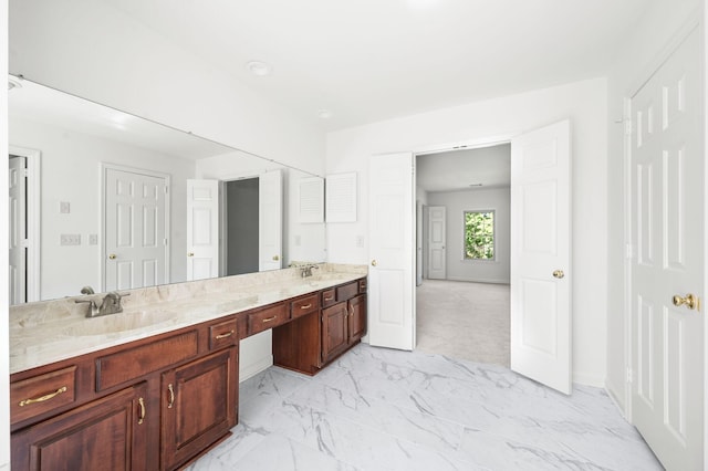 1008 Green Hill Cv, Brentwood, TN 37027 - bathroom with baseboards, marble finish floor, a sink, and double vanity