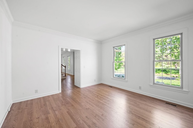 1008 Green Hill Cv, Brentwood, TN 37027 - unfurnished room with wood finished floors, visible vents, crown molding, and baseboards