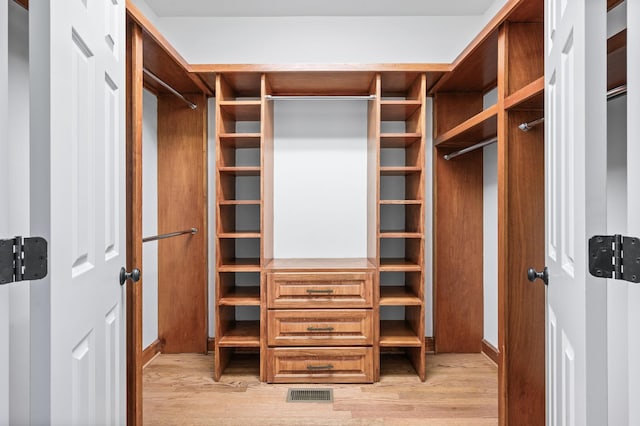 1008 Green Hill Cv, Brentwood, TN 37027 - walk in closet featuring light wood-type flooring and visible vents