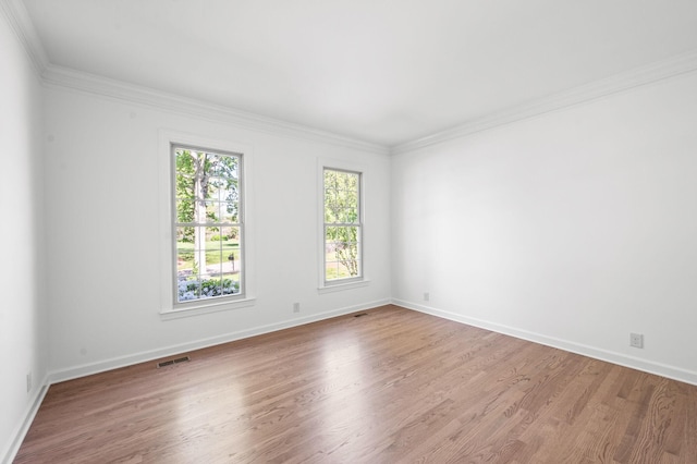 1008 Green Hill Cv, Brentwood, TN 37027 - unfurnished room with wood finished floors, visible vents, baseboards, and ornamental molding