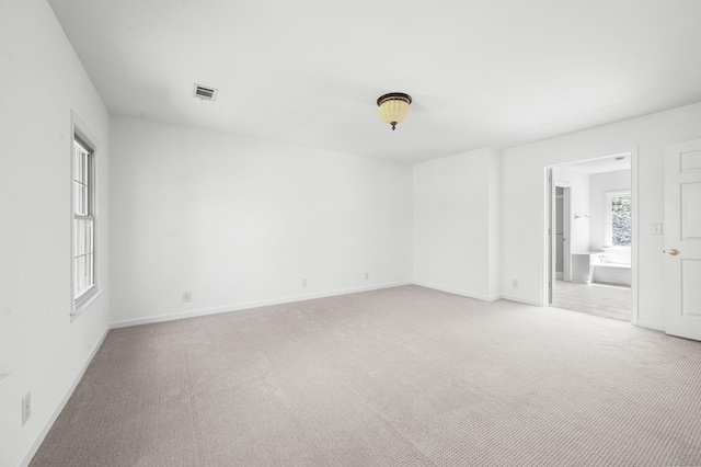 1008 Green Hill Cv, Brentwood, TN 37027 - empty room with light colored carpet, baseboards, and visible vents