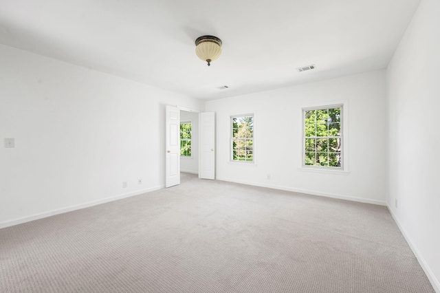 1008 Green Hill Cv, Brentwood, TN 37027 - unfurnished room with baseboards, visible vents, and plenty of natural light