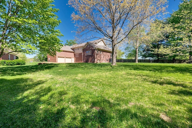 1008 Green Hill Cv, Brentwood, TN 37027 - view of yard featuring fence and an attached garage