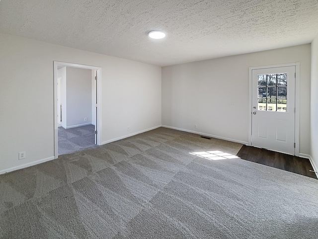 958 Clearview Rd, Cottontown, TN 37048 - empty room featuring baseboards, visible vents, carpet, and a textured ceiling