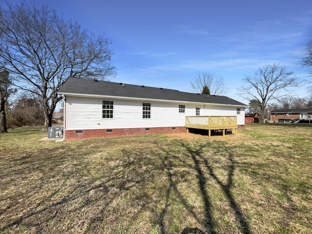 958 Clearview Rd, Cottontown, TN 37048 - back of property with a lawn, crawl space, roof with shingles, and a deck