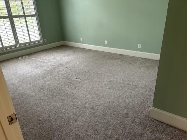 247 Woods Ferry Cir, Gallatin, TN 37066 - spare room featuring carpet flooring and baseboards