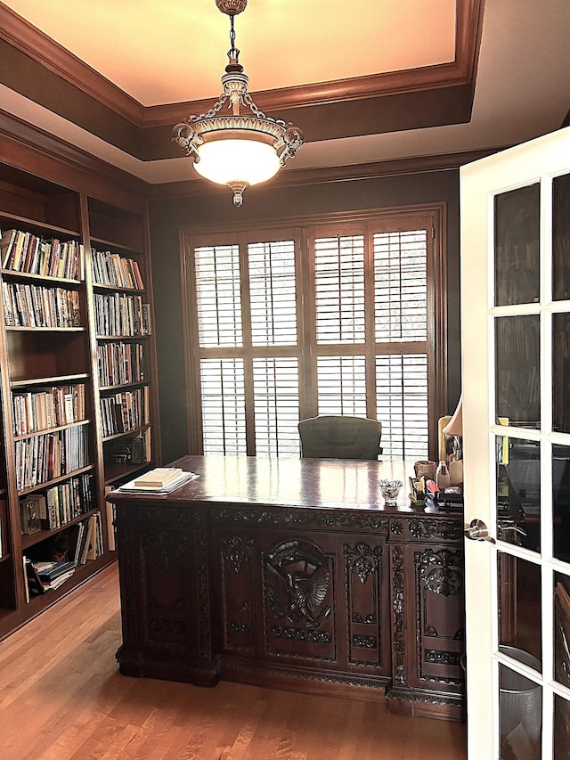 247 Woods Ferry Cir, Gallatin, TN 37066 - home office featuring ornamental molding, light wood-style flooring, a tray ceiling, and built in shelves