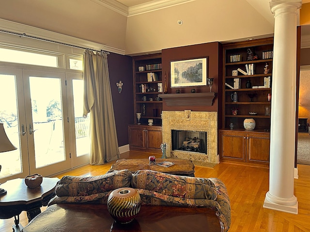 247 Woods Ferry Cir, Gallatin, TN 37066 - living area featuring ornate columns, crown molding, wood finished floors, a premium fireplace, and built in features