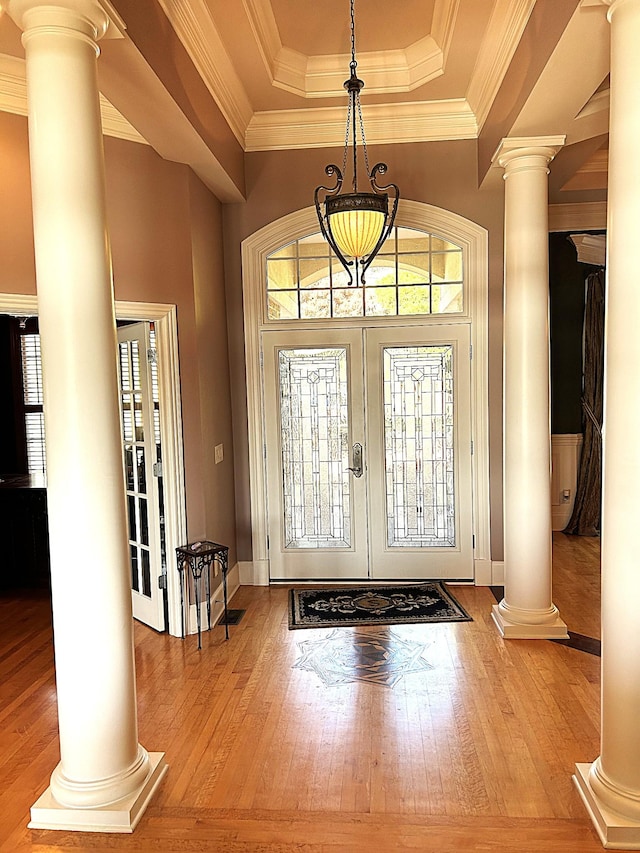 247 Woods Ferry Cir, Gallatin, TN 37066 - foyer featuring ornate columns, hardwood / wood-style flooring, a raised ceiling, french doors, and ornamental molding