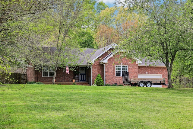 1043 Lena Rosson Rd, Chapmansboro, TN 37035 - ranch-style house featuring brick siding, a front lawn, and fence