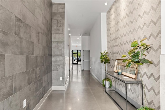 1638 54th Ave N Unit 320, Nashville, TN 37209 - hallway featuring baseboards, recessed lighting, and finished concrete flooring