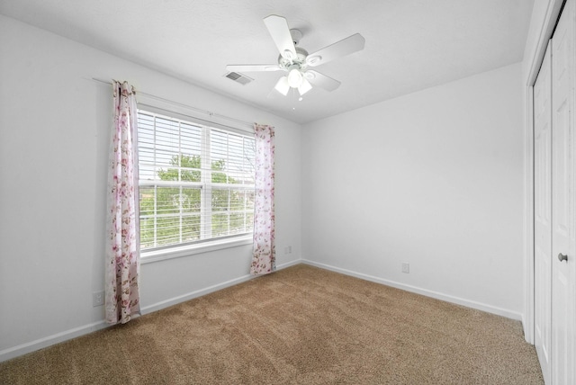 3051 Outfitters Dr, Clarksville, TN 37040 - spare room with baseboards, a ceiling fan, visible vents, and carpet flooring