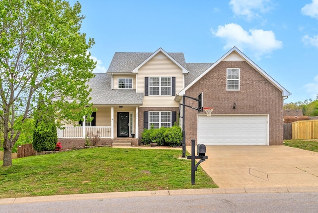 3051 Outfitters Dr, Clarksville, TN 37040 - traditional home with fence, covered porch, driveway, and brick siding