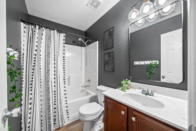 3051 Outfitters Dr, Clarksville, TN 37040 - full bathroom with shower / bath combination with curtain, wood finished floors, visible vents, toilet, and vanity
