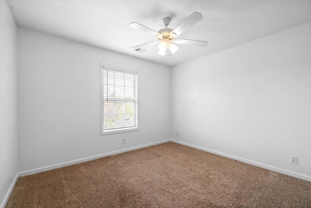 3051 Outfitters Dr, Clarksville, TN 37040 - empty room with carpet floors, a ceiling fan, visible vents, and baseboards
