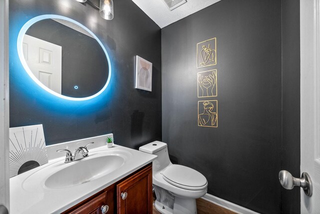 3051 Outfitters Dr, Clarksville, TN 37040 - half bathroom with visible vents, toilet, and vanity