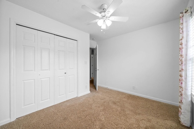 3051 Outfitters Dr, Clarksville, TN 37040 - unfurnished bedroom with baseboards, a ceiling fan, carpet flooring, and a closet