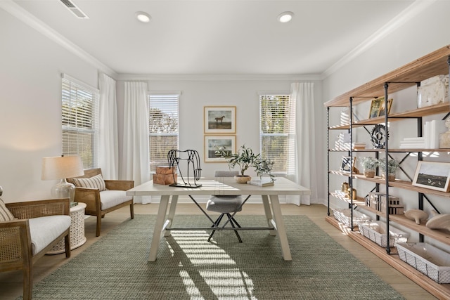 office area featuring visible vents, recessed lighting, light wood-style floors, and crown molding