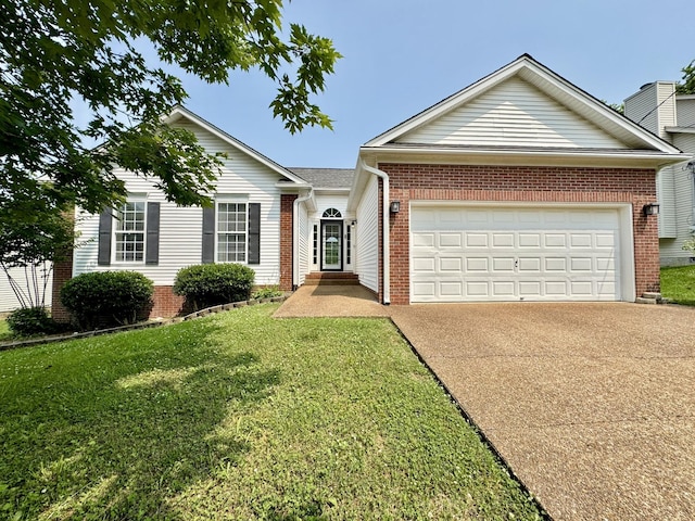 1456 Brighton Cir, Old Hickory, TN 37138 - view of front of home featuring a garage, concrete driveway, brick siding, and a front lawn