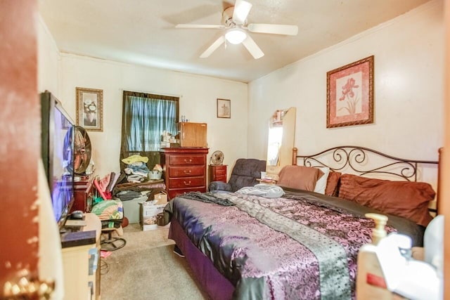 carpeted bedroom featuring a ceiling fan