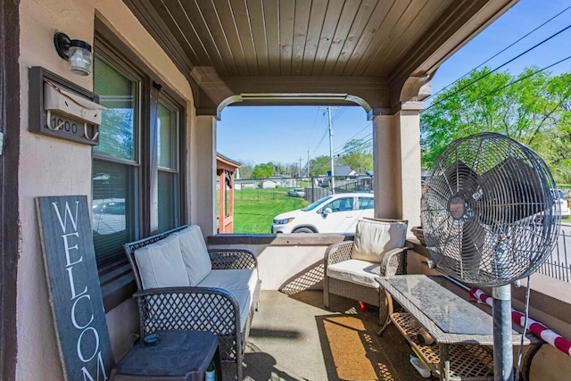 view of patio with a fenced in pool and fence