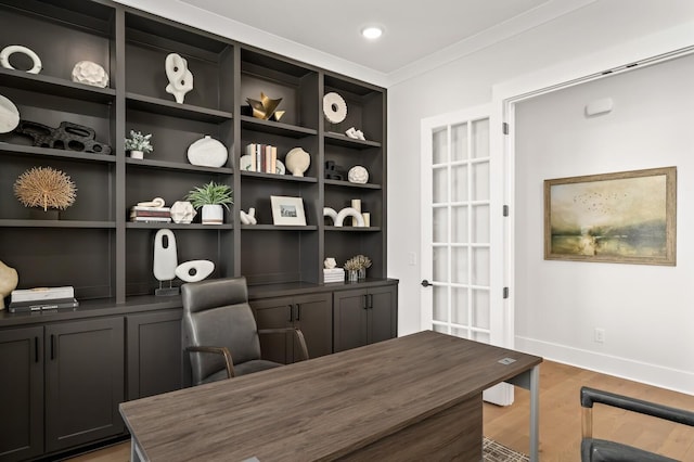 home office featuring baseboards, recessed lighting, and light wood-style floors