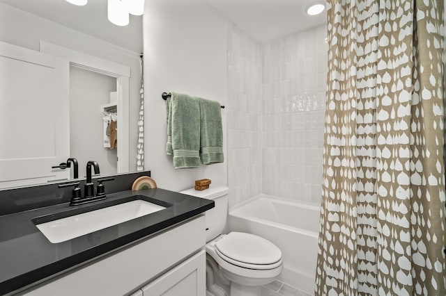 full bathroom with shower / tub combo with curtain, toilet, and vanity