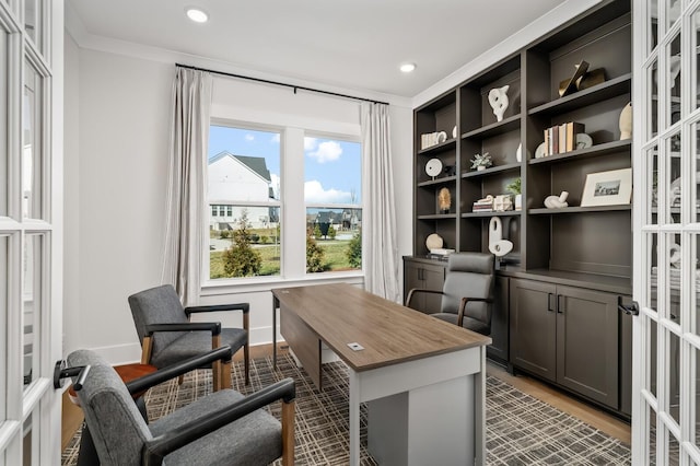 office area with baseboards, ornamental molding, wood finished floors, and recessed lighting