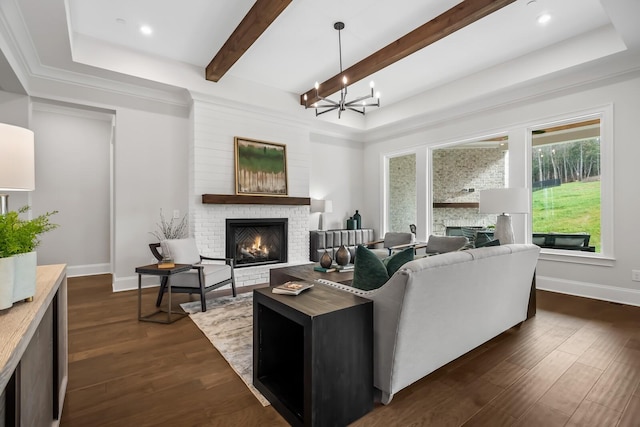 living room featuring beam ceiling, dark wood-style floors, and a fireplace