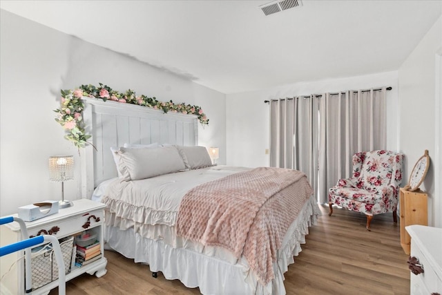 470 S Main St Unit 106, Ashland City, TN 37015 - bedroom featuring wood finished floors and visible vents