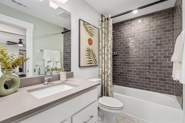 bathroom with toilet, visible vents, shower / tub combo, ceiling fan, and vanity