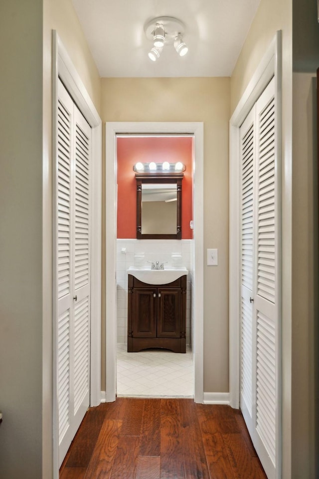 110 Ewingville Dr, Franklin, TN 37064 - bathroom with a closet, vanity, and wood finished floors