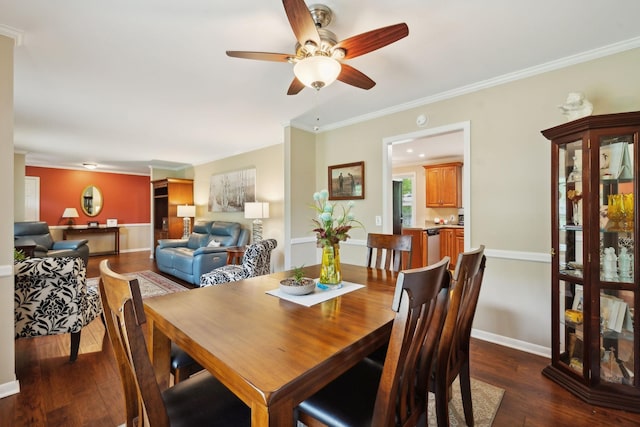 110 Ewingville Dr, Franklin, TN 37064 - dining space with ceiling fan, dark wood-style flooring, crown molding, and baseboards